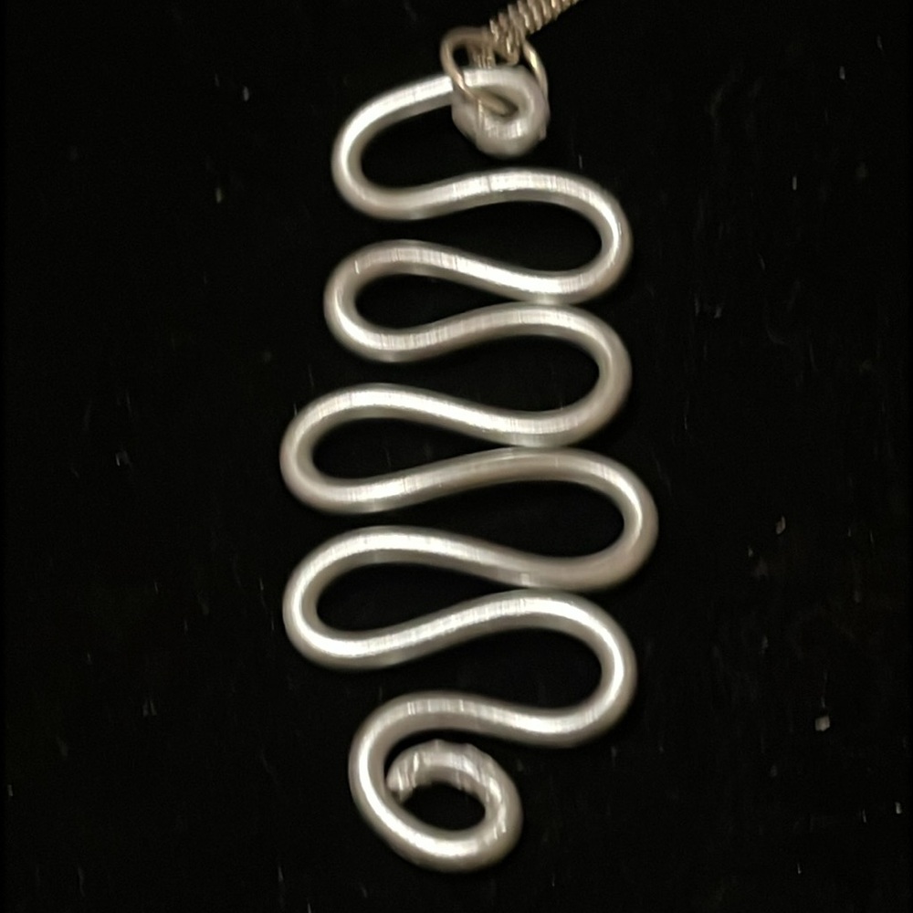 Elegant Silver Wave Hand Design Necklace - Picture 8 of 17